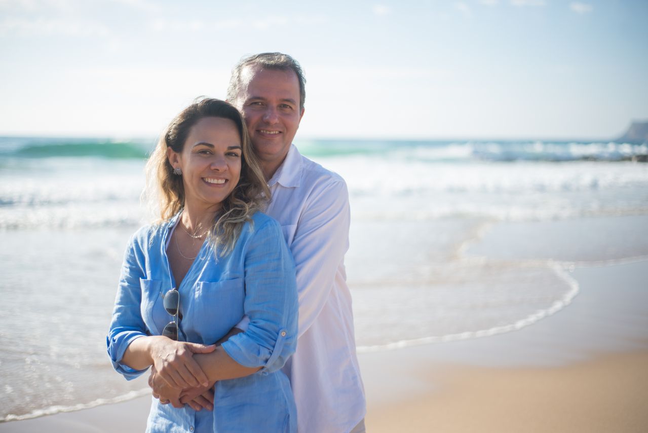 A relaxed couple enjoying their retirement by the beach